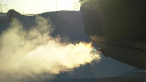 combustion fumes coming out of car exhaust pipe, exhaust gases close up video. CO2 emissions from cars and motor vehicles. greenhouse gases, which contribute to climate change.