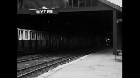 Hythe , England, 1970 - Romney Hythe and Dymchurch railway narrow gauge train enters Hythe station