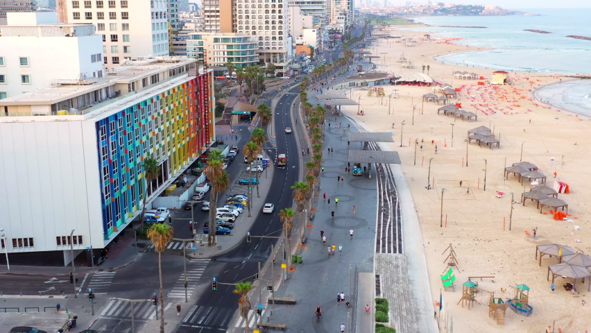 Aerial Forward Beautiful Shot Of Buildings By Beach In City - Tel Aviv, Israel
