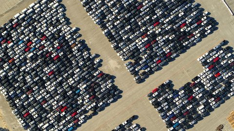 Aerial Spinning Over A Parking Lot Of Many Cars Crowded Into Tandem Lanes - Los Angeles, California