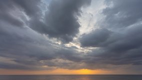 
clouds are moving slowly to the sea in the stunning sky during sunset.
Nature video High quality footage. 
Scene of Colorful romantic sky sunset with cloud in sky background.
