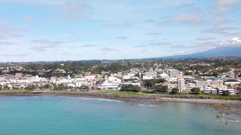 New Plymouth, Taranaki, New Zealand. Aerial cityscape of city on the shore, sunny day