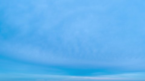 4k stock video time lapse of beautiful sunset peaceful cloudy blue sky. Abstract natural video bakground