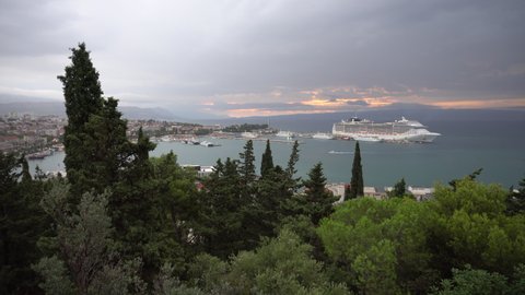 SPLIT, CROATIA - AUGUST 27, 2021: View from the hill on rainy cloudy sunrise morning Split, Croatia. 4K, Audio, Wide shot