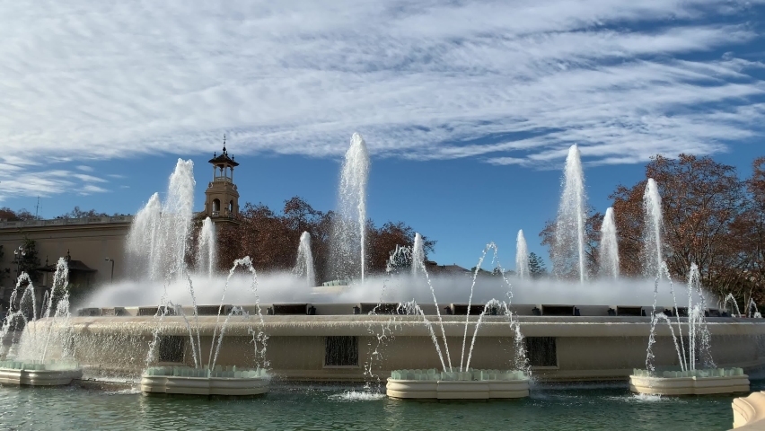 Day time view of Magic fountain of Montjuic. Motion of water sprinkles. This fountain is famous for shows. It is located in front of placa d