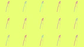 Lipsticks pattern in vibrant gradient holographic neon colors. Concept art. Minimal surrealism background. Seamless pattern with lipstick. Realistic animation. 4K video motion - Powered by Shutterstock - Get 15% off with code: PIKWIZARD15