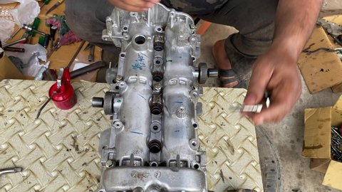 Car engine overhaul,car engine repair, engine repair by mechanic 