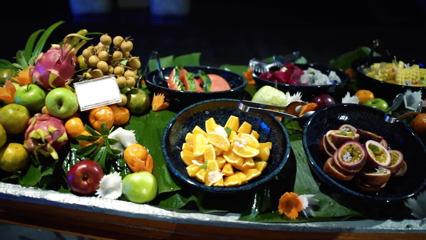 Various fresh Thai fruits famous Asian tourist attraction destination. Fresh mixed fruits on wood table event party night background. Top view. Copy space - Powered by Shutterstock - Get 15% off with code: PIKWIZARD15