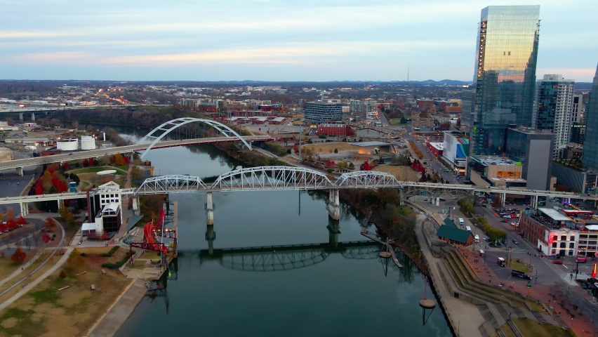 Aerial drone view approaching the John Seigenthaler Pedestrian Bridge, in Nashville, USA Royalty-Free Stock Footage #1085010700
