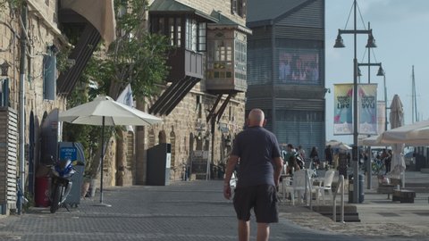 01.05.2020, Old Jaffa,Israel. People walk in the old port of old Jaffa