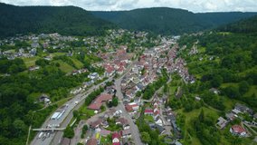 Aerial of the city Alpirsbach in Germany. On sunny day in spring