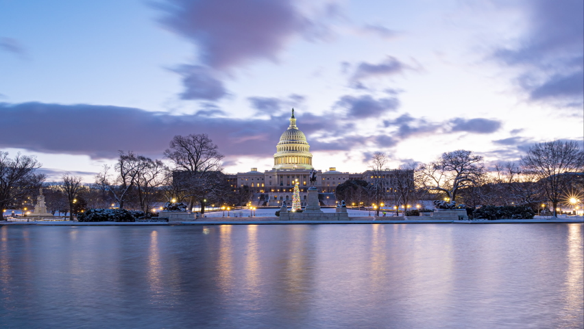 A 4k blue hour to sunrise timelapse of the US Capitol and reflecting pool right after a snowstorm. 