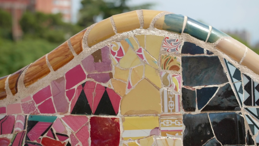 A 4K of a colorful bench by Spanish architect Antoni  Gaudi
