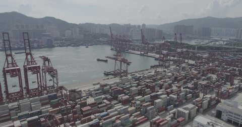 HONG KONG, HONG KONG - May 07, 2018: A 4K aerial view of Hong Kong industrial port in Lai King area, shipping containers
