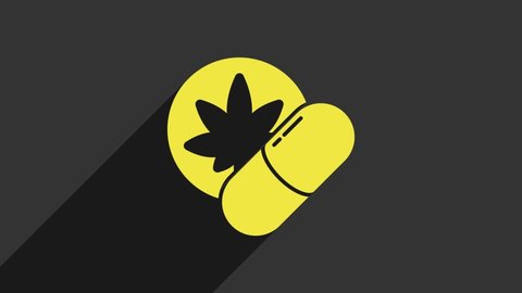 Yellow Herbal ecstasy tablets icon isolated on grey background. 4K Video motion graphic animation.