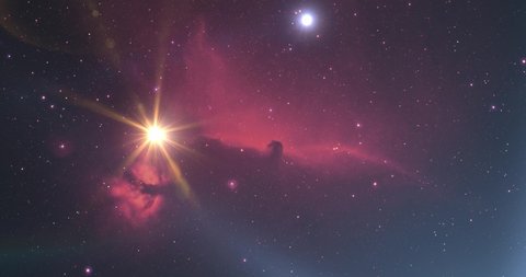 Horsehead nebula NGC2024 and moving stars through universe.