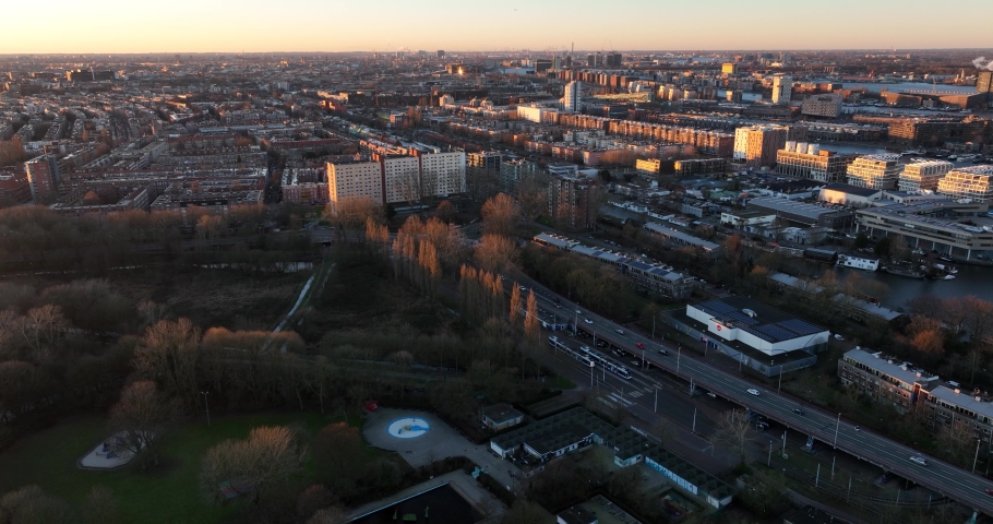 Aerial footage of the Indische Buurt in Stadsdeel Amsterdam Oost. Urban residential area with retail estate and appartments on a winter day.