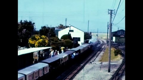 Romney Marsh, England, 1968 - The Romney, Hythe and Dymchurch miniature railway line leaves the station full of tourists