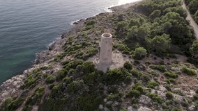 Aerial 4k footage of medieval coastal defensive tower of La Corda in Oropesa, Spain