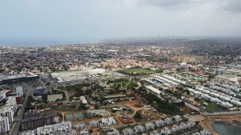 Talatona Luanda Angola - 12 20 2021: Aerial drone footage of Talatona city, residential area with condominiums with luxury houses and office buildings, metropolitan area of Luanda in Angola