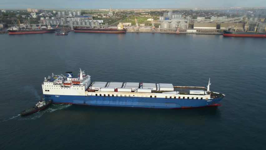 aerial view of the ship Cargo ship entering the port aerial filming 4K video