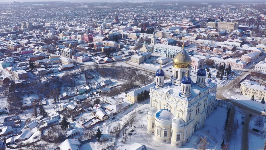 Scenic aerial view of main Orthodox church in Russian city of Yelets, five domed Ascension Cathedral on sunny winter day Royalty-Free Stock Footage #1085097356