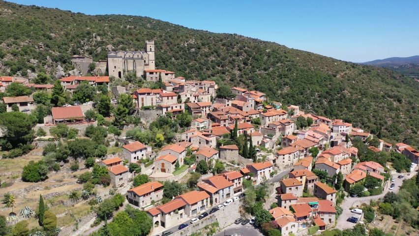 Panoramic view from above on the city Eus. Small town located on high mountain. Eastern Pyrenees. France. High quality 4k footage