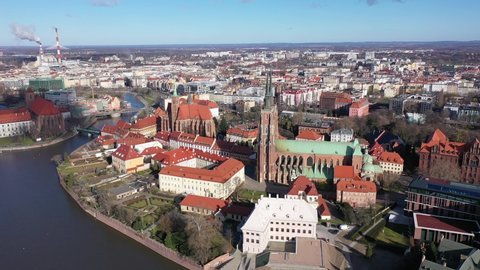 Aerial view of island of Ostrow Tumski in Wroclaw with Cathedral of St. John the Baptist on sunny spring day