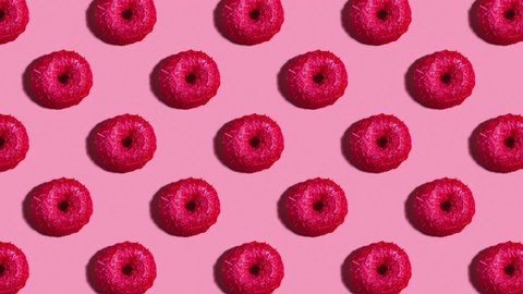 Seamless background with red raspberry donut. Pink pattern.