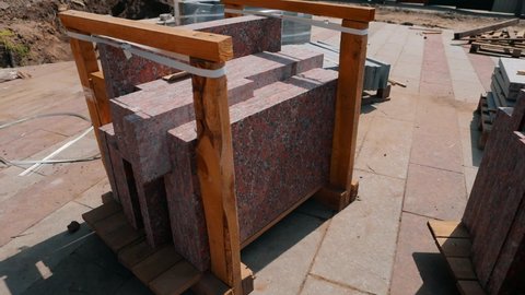 Granite tiles. Pallet with granite tiles. Granite tiles at construction site