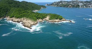 Aerial video approaching the beach of love on the island of la roqueta, Acapulco