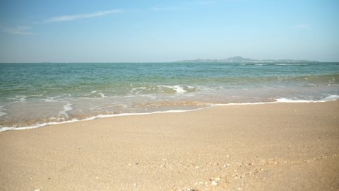 Landscape sand beach sea on sun light in the summer. Gentle waves Pattaya beaches Thailand.