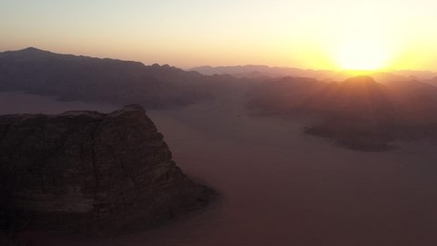 Aerial view of a sunset in the huge desert of Wadi Rum, Jordan