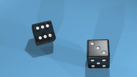Dice falling on gambling table. Two black plastic cubes show number 9.