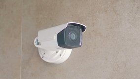 Security camera on the wall in 4k slow motion 