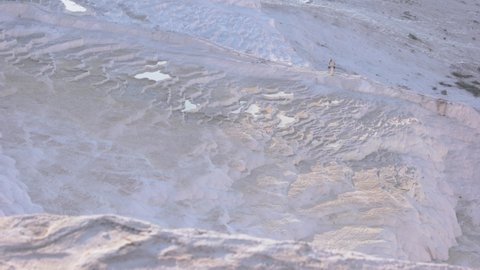 Pamukkale travertines texture background. Surface of limestone travertines thermal.