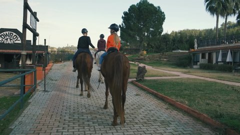 Kemer, Antalya, Turkey, January 04.2022. Group family horse riding. Tree horses in beautiful nature.