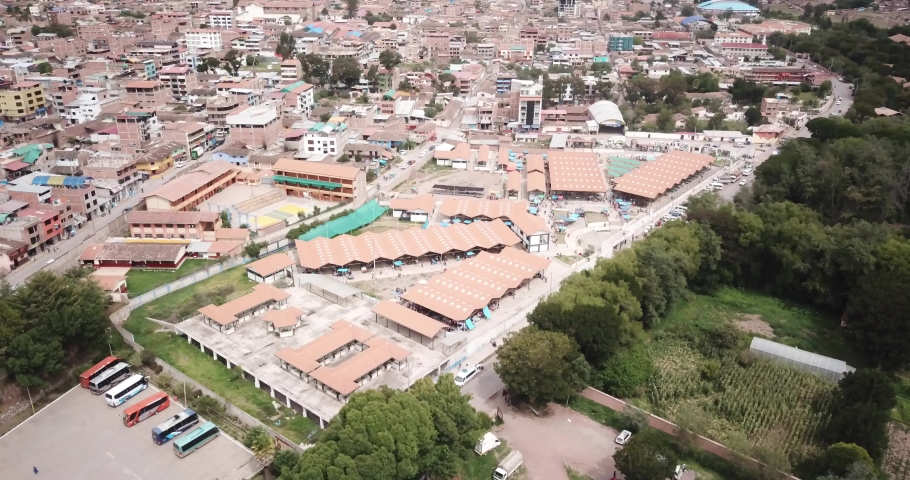 Aerial view of the producer market in Urubamba Cusco. Open market in Peruvian Andes in the Sacred Valley.