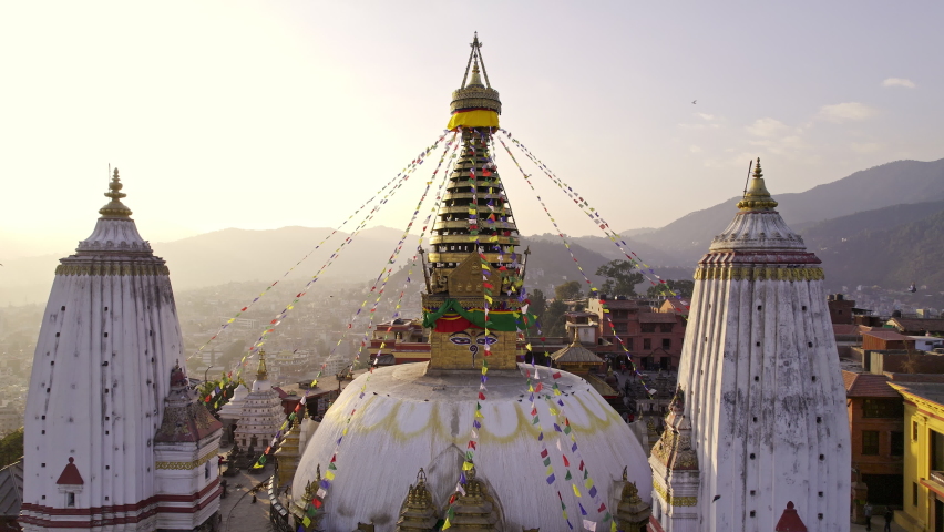 Flying backwards viewing Swayambhunath Stupa in Kathmandu Nepal.