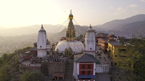 Swayambhunath Stupa in Kathmandu Nepal flying in closer to the religious complex.