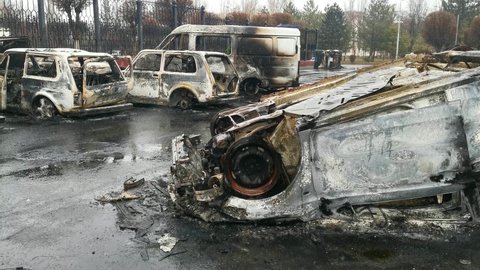 Taraz, Kazakhstan - January 7, 2022 - Burnt out cars after protests and unrest in Kazakhstan