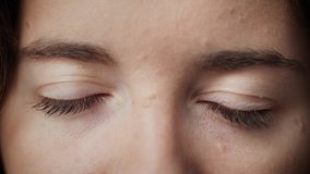 Collage of close-up of eyes and faces of people of different ages and genders. Beautiful montage of persons of diverse ethnicities looking at camera. Blue, green and brown iris. Slow-motion, 4K. - Powered by Shutterstock - Get 15% off with code: PIKWIZARD15