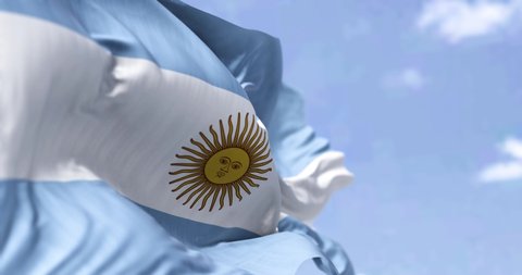 Detailed close up of the national flag of Argentina waving in the wind on a clear day. Democracy and politics. South american country. Selective focus. Seamless Slow motion