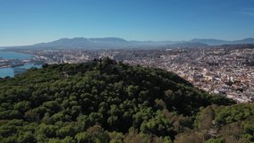 Aerial 4K video from drone to of Malaga Gibralfaro castle in the background a panoramic view of the city of Malaga. Malaga.Spain,Costa del sol, Andalusia (Series)