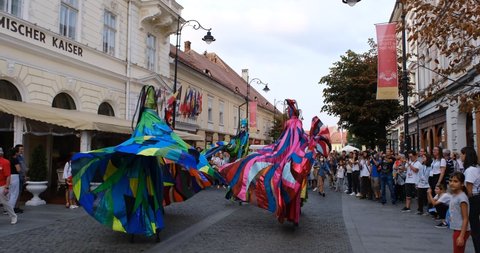 Sibiu City, Romania - 24 August 2021. Colors, Teatro Pavana ItalyNetherlands. Stilted artists Performing during the International Theatre Festival from Sibiu, Romania.