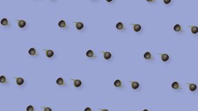 Colorful fruit pattern of fresh rotating figs on purple background. Seamless pattern with fig. Realistic animation. 4K video motion