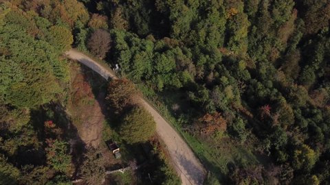 Aerial video from a drone with a view of the Caucasian mountains covered with forest in Abkhazia, near the city of Tkuarchal.