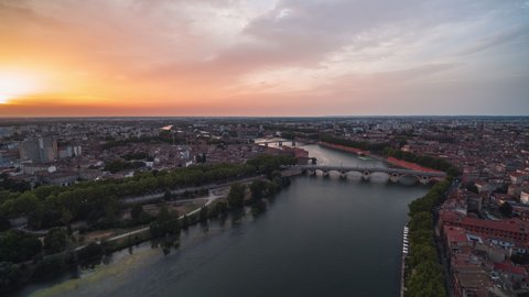 Establishing Aerial View Shot of Toulouse Fr, Haute-Garonne, France, push in, wonderful jolly colours on the sky