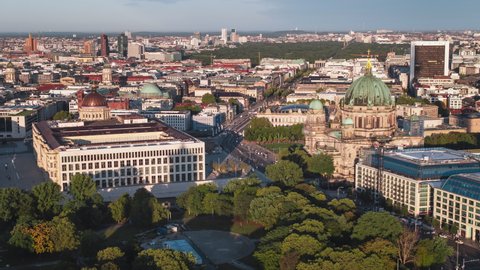 Establishing Aerial View Shot of Berlin, Germany, capital city, Berliner Innenstadt Museum Island Berlin Cathedral, amazing sun