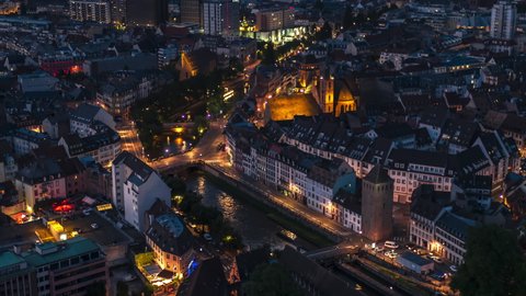 Strasbourg, France - circa 2021 - Establishing Aerial View Shot of Strasbourg Fr, capital of European Union, Bas-Rhin, France. Petite France at night